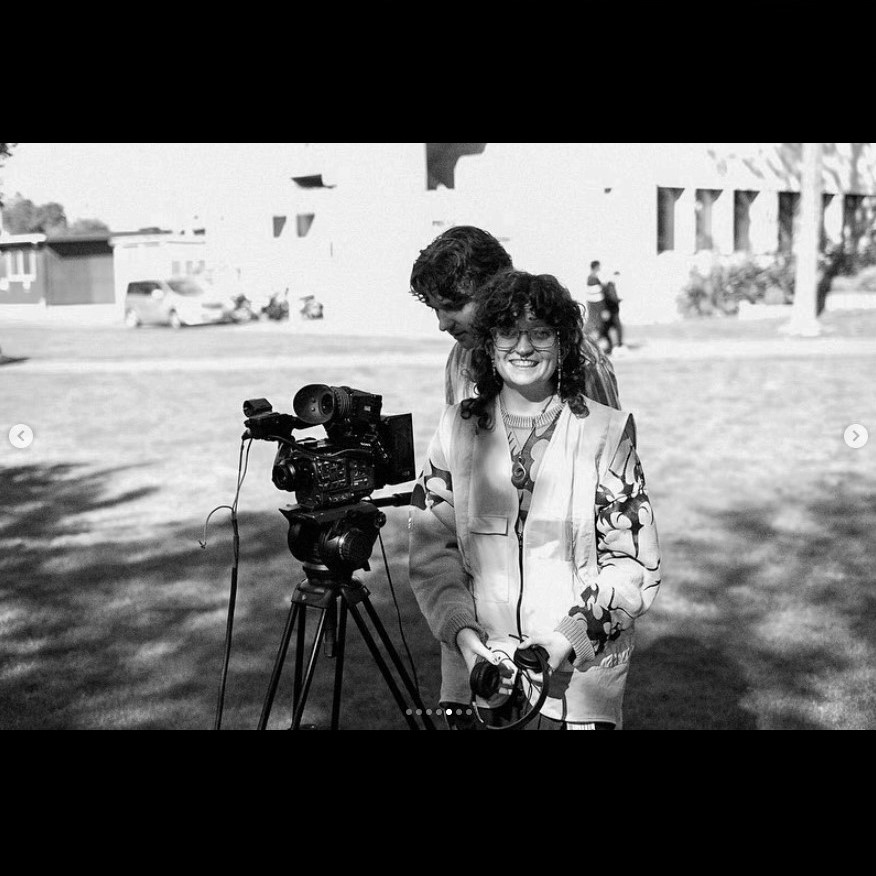 Students on set with camera equipment